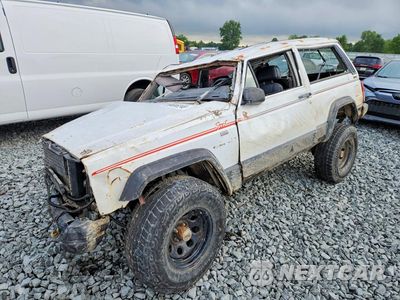 1990 JEEP CHEROKEE SPORT 1J4FJ87LXLL124862 - główne zdjęcie licytacji z USA - miniatura