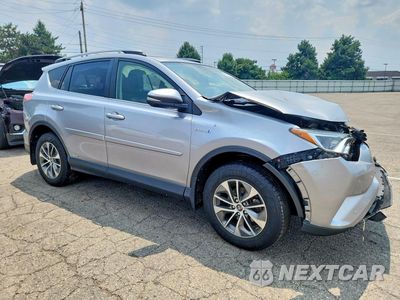 Czwarte zdjęcie samochodu z boku: 2018 TOYOTA RAV4 HYBRID XLE VIN:JTMRJREV1JD242027 - miniatura