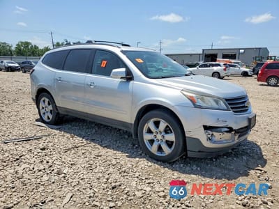 Czwarte zdjęcie samochodu z boku: 2016 CHEVROLET TRAVERSE LT VIN:1GNKVGKD7GJ327588 - miniatura