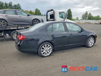 Trzecie zdjęcie samochodu z tyłu: 2010 VOLKSWAGEN JETTA WOLFSBURG VIN:3VWRJ7AJ4AM019473 - miniatura