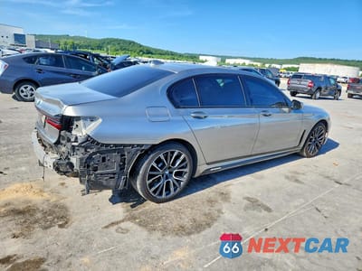 Trzecie zdjęcie samochodu z tyłu: 2020 BMW 750 XI VIN:WBA7U2C08LGJ59870 - miniatura