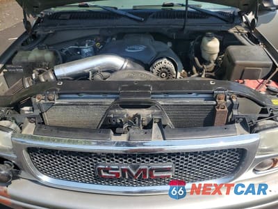 Zdjęcie 11 z 12 samochodu: 2003 GMC YUKON DENALI VIN:1GKEK63U73J170358 - miniatura