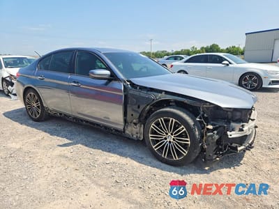 Czwarte zdjęcie samochodu z boku: 2018 BMW 530 XI VIN:WBAJA7C5XJWA74543 - miniatura