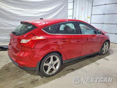 Trzecie zdjęcie samochodu z tyłu: 2012 FORD FOCUS TITANIUM VIN:1FAHP3N29CL432797 - miniatura