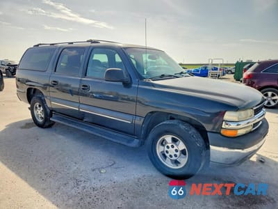Czwarte zdjęcie samochodu z boku: 2003 CHEVROLET SUBURBAN C1500 VIN:3GNEC16Z03G213255 - miniatura