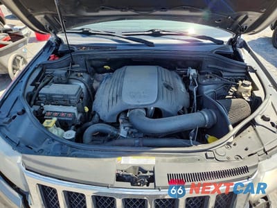 Zdjęcie 12 z 13 samochodu: 2012 JEEP GRAND CHEROKEE OVERLAND VIN:1C4RJFCT3CC192059 - miniatura