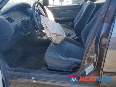 Zdjęcie 7 z 12 samochodu: 1994 TOYOTA COROLLA DX VIN:1NXAE09B0RZ209895 - miniatura
