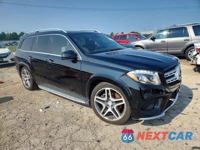 Czwarte zdjęcie samochodu z boku: 2017 MERCEDES-BENZ GLS 550 4MATIC VIN:4JGDF7DE7HA885765 - miniatura