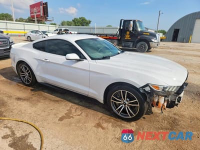 Czwarte zdjęcie samochodu z boku: 2016 FORD MUSTANG VIN:1FA6P8TH7G5303303 - miniatura