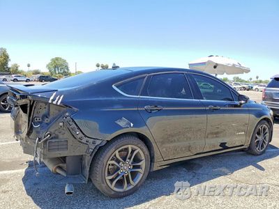 Trzecie zdjęcie samochodu z tyłu: 2018 FORD FUSION SE HYBRID VIN:3FA6P0LU8JR247794 - miniatura