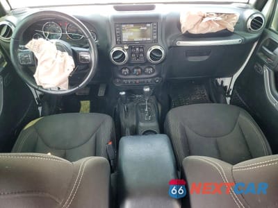 Zdjęcie 8 z 13 samochodu: 2017 JEEP WRANGLER UNLIMITED SAHARA VIN:1C4BJWEGXHL524989 - miniatura