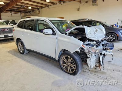 Czwarte zdjęcie samochodu z boku: 2014 MITSUBISHI OUTLANDER SE VIN:JA4AZ3A35EZ017667 - miniatura