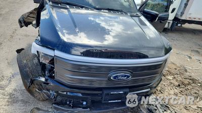 Czwarte zdjęcie samochodu z boku: 2023 FORD F150 LIGHTNING PRO/LIGHTNING XLT/LI VIN:1FTVW1EL3PWG29708 - miniatura