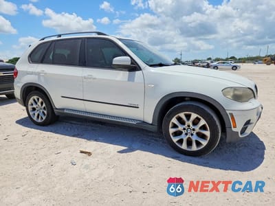 Czwarte zdjęcie samochodu z boku: 2011 BMW X5 XDRIVE35I VIN:5UXZV4C56BL738232 - miniatura
