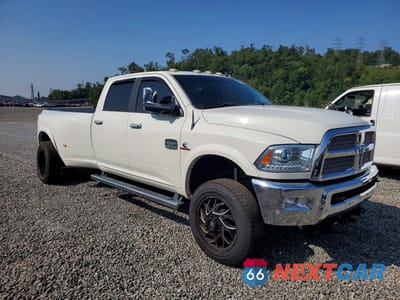 Czwarte zdjęcie samochodu z boku: 2016 RAM 3500 LONGHORN VIN:3C63RRKL3GG208823 - miniatura