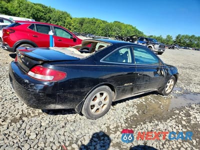 Trzecie zdjęcie samochodu z tyłu: 1999 TOYOTA CAMRY SOLARA SLE V6 VIN:2T1CF28P1XC242210 - miniatura
