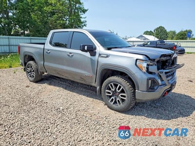 Czwarte zdjęcie samochodu z boku: 2021 GMC SIERRA K1500 AT4 VIN:1GTU9EET1MZ174104 - miniatura