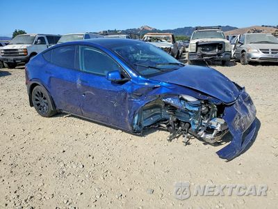 Czwarte zdjęcie samochodu z boku: 2024 TESLA MODEL Y VIN:7SAYGAEE9RF983478 - miniatura