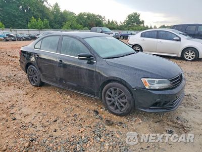 Czwarte zdjęcie samochodu z boku: 2017 VOLKSWAGEN JETTA SE VIN:3VWDB7AJ8HM384692 - miniatura