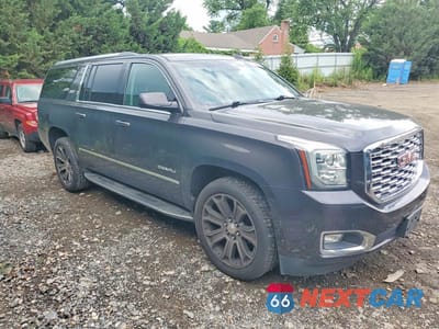 Czwarte zdjęcie samochodu z boku: 2017 GMC YUKON XL DENALI VIN:1GKS2HKJ1HR397561 - miniatura