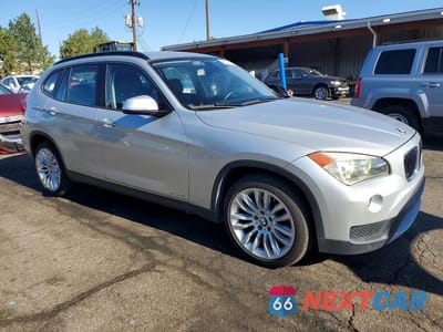 Czwarte zdjęcie samochodu z boku: 2014 BMW X1 SDRIVE28I VIN:WBAVM1C56EVW50790 - miniatura