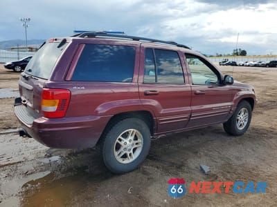 Trzecie zdjęcie samochodu z tyłu: 1999 JEEP GRAND CHEROKEE LIMITED VIN:1J4GW68N0XC597654 - miniatura