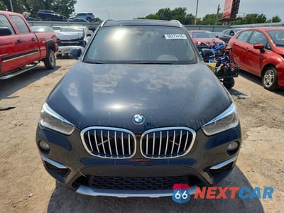 Piąte zdjęcie samochodu w środku: 2016 BMW X1 VIN:WBXHT3Z35G4A49177 - miniatura