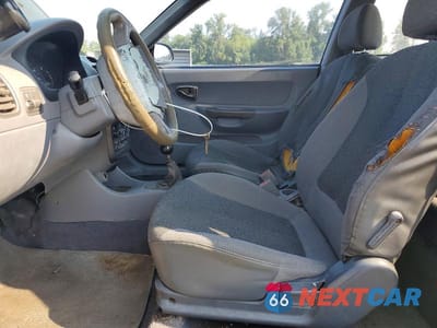 Zdjęcie 7 z 13 samochodu: 2000 HYUNDAI ACCENT L VIN:KMHCF35G7YU039171 - miniatura