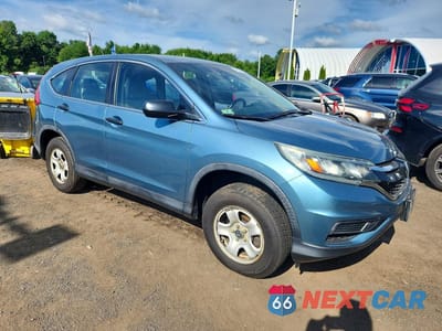 Czwarte zdjęcie samochodu z boku: 2015 HONDA CR-V LX VIN:5J6RM4H37FL103600 - miniatura