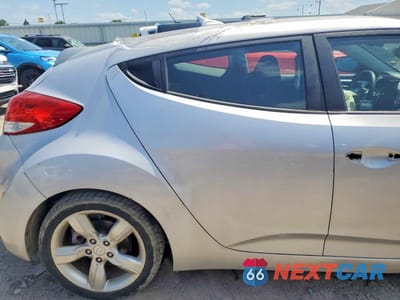 Zdjęcie 10 z 12 samochodu: 2012 HYUNDAI VELOSTER BASE VIN:KMHTC6AD4CU051471 - miniatura