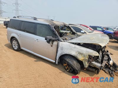 Czwarte zdjęcie samochodu z boku: 2010 FORD FLEX SE VIN:2FMGK5BC6ABA98976 - miniatura