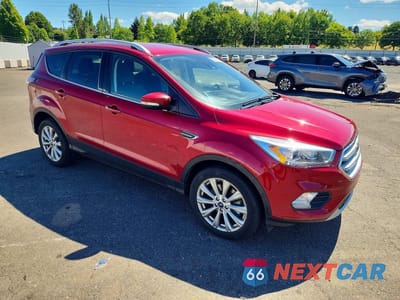 Czwarte zdjęcie samochodu z boku: 2018 FORD ESCAPE TITANIUM VIN:1FMCU0J95JUA04792 - miniatura