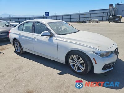 Czwarte zdjęcie samochodu z boku: 2018 BMW 330 I VIN:WBA8B9G57JNU96628 - miniatura