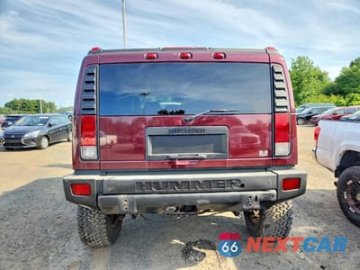 Zdjęcie 6 z 13 samochodu: 2006 HUMMER H2 VIN:5GRGN23U66H100235 - miniatura