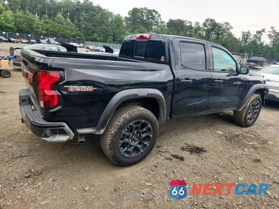 Trzecie zdjęcie samochodu z tyłu: 2026 CHEVROLET COLORADO TRAIL BOSS VIN:1GCPTEEK7T1179505 - miniatura