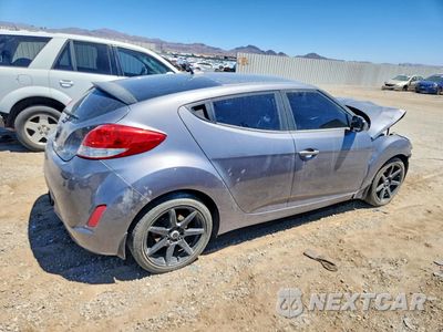 Trzecie zdjęcie samochodu z tyłu: 2013 HYUNDAI VELOSTER BASE VIN:KMHTC6AD4DU166752 - miniatura