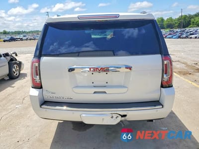 Zdjęcie 6 z 13 samochodu: 2018 GMC YUKON XL DENALI VIN:1GKS2HKJ4JR178891 - miniatura