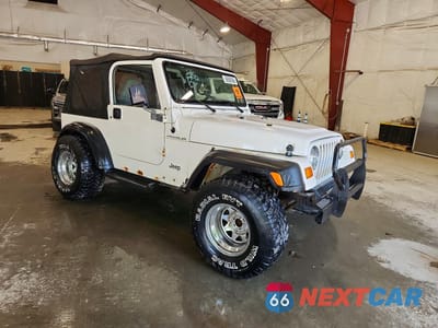 Czwarte zdjęcie samochodu z boku: 1998 JEEP WRANGLER / TJ SE VIN:1J4FY29P4WP756956 - miniatura