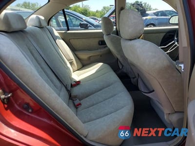 Zdjęcie 10 z 12 samochodu: 2002 HYUNDAI ELANTRA GLS VIN:KMHDN45D92U399911 - miniatura