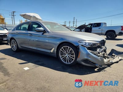 Czwarte zdjęcie samochodu z boku: 2018 BMW 530E VIN:WBAJA9C57JG622906 - miniatura