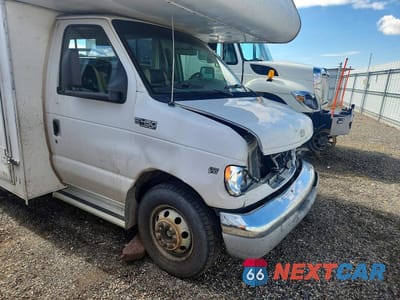 Zdjęcie 9 z 10 samochodu: 2002 FORD ECONOLINE E450 SUPER DUTY CUTAWAY VAN VIN:1FDXE45S92HB31039 - miniatura