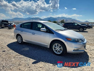Czwarte zdjęcie samochodu z boku: 2010 HONDA INSIGHT EX VIN:JHMZE2H76AS009702 - miniatura