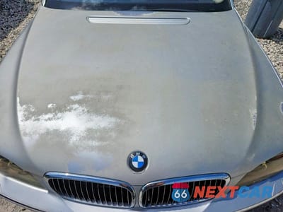 Zdjęcie 11 z 12 samochodu: 2006 BMW 750 LI VIN:WBAHN83556DT60972 - miniatura