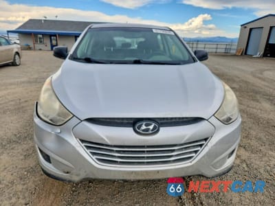 Piąte zdjęcie samochodu w środku: 2010 HYUNDAI TUCSON GLS VIN:KM8JT3AC4AU077594 - miniatura