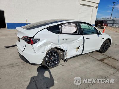 Trzecie zdjęcie samochodu z tyłu: 2021 TESLA MODEL Y VIN:5YJYGDEE2MF302102 - miniatura