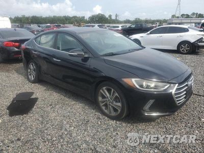 Czwarte zdjęcie samochodu z boku: 2017 HYUNDAI ELANTRA LIMITED VIN:KMHD84LF2HU170023 - miniatura