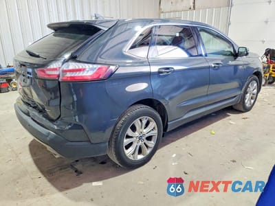 Trzecie zdjęcie samochodu z tyłu: 2021 FORD EDGE TITANIUM VIN:2FMPK4K93MBA26930 - miniatura