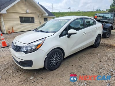 2014 KIA RIO LX KNADM4A32E6361950 - główne zdjęcie licytacji z USA - miniatura
