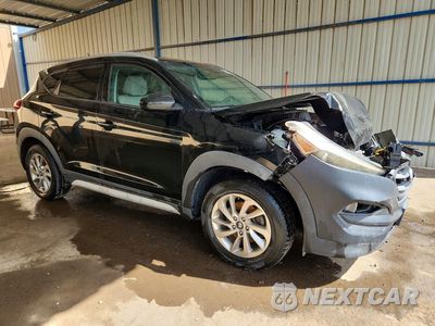 Czwarte zdjęcie samochodu z boku: 2017 HYUNDAI TUCSON SE VIN:KM8J3CA41HU480497 - miniatura