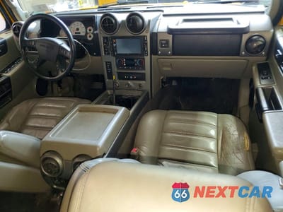 Zdjęcie 8 z 13 samochodu: 2003 HUMMER H2 VIN:5GRGN23U83H141588 - miniatura